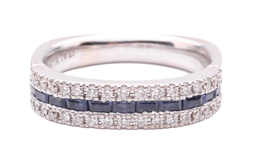 Lot 53 - A sapphire and diamond half eternity ring, set...