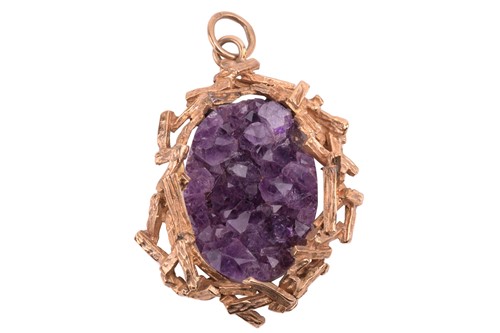 Lot 204 - A Modernist amethyst pendant of bird nest...