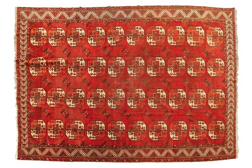 Lot 218 - An antique/old "Country House"Turkmen carpet...