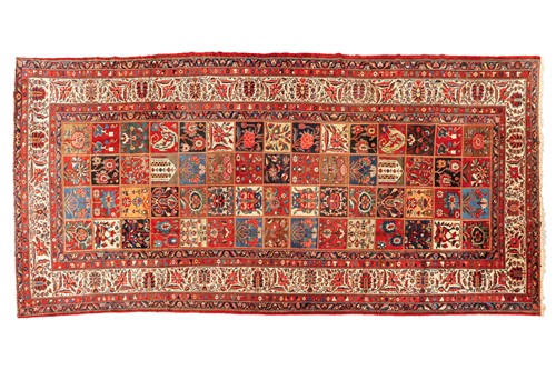 Lot 155 - A large old Baktiari main carpet with a...
