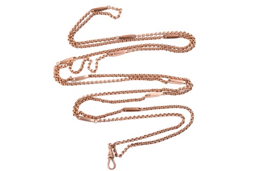 Lot 31 - A long guard chain composed of belcher links...