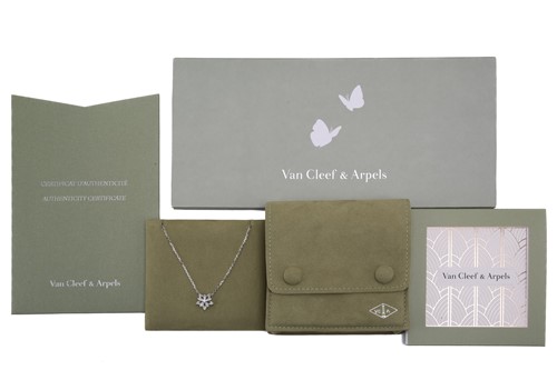 Lot 304 - Van Cleef & Arpels - a diamond-set lotus...