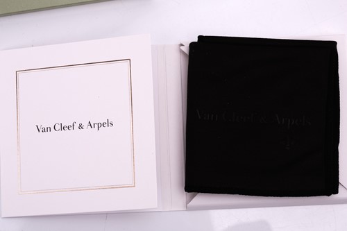 Lot 304 - Van Cleef & Arpels - a diamond-set lotus...