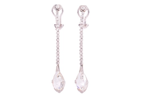 Lot 96 - A pair of diamond drop earrings, suspended...