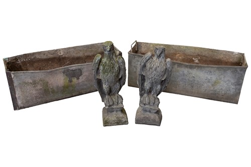 Lot 186 - A pair of lead based ornamental garden eagle,...