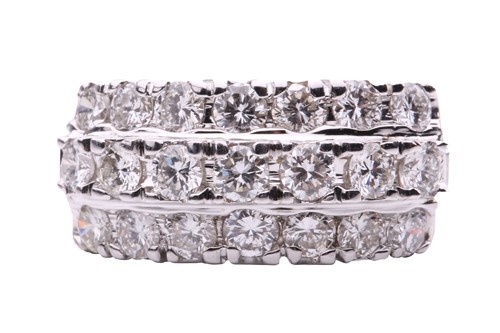Lot 24 - A diamond dress ring, set with three rows of...