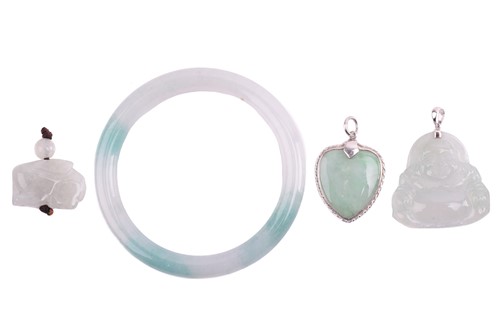 Lot 63 - A small collection of Chinese carved jade...