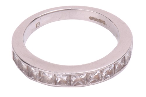 Lot 74 - A diamond half-eternity ring in platinum,...