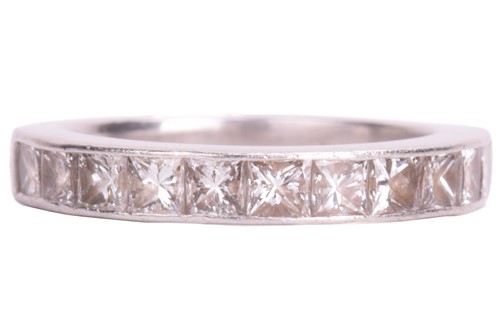 Lot 74 - A diamond half-eternity ring in platinum,...