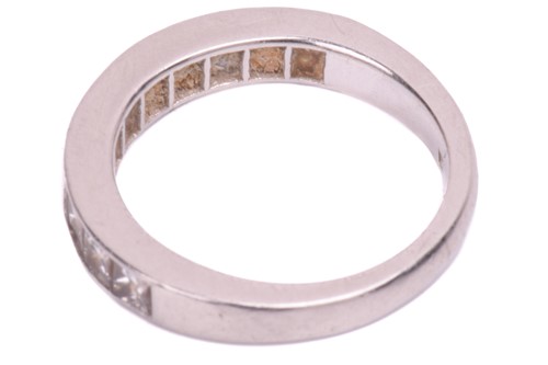 Lot 74 - A diamond half-eternity ring in platinum,...