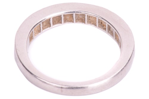 Lot 74 - A diamond half-eternity ring in platinum,...