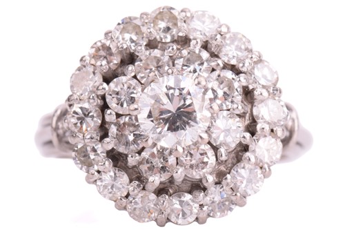 Lot 203 - A diamond cluster ring, set with round...