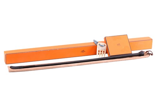 Lot 379 - Hermès - of equestrian interest, a leather...