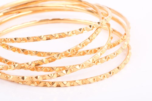 Lot 43 - A set of six Indian bangles, together with a...