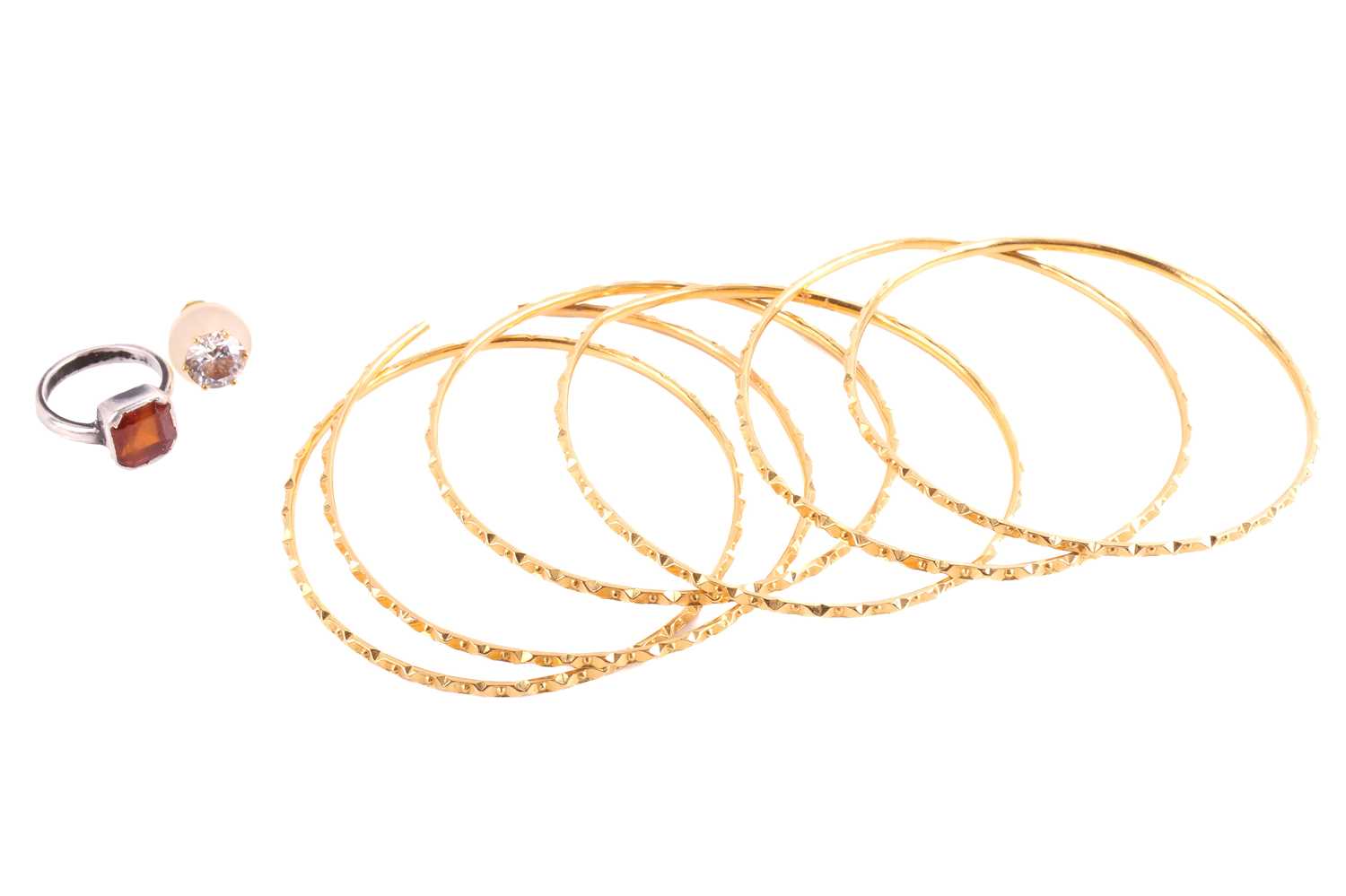 Lot 43 - A set of six Indian bangles, together with a...