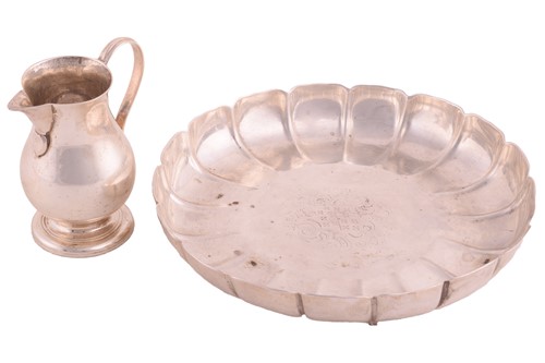 Lot 561 - A George II silver lobed dish by Edward Feline,...