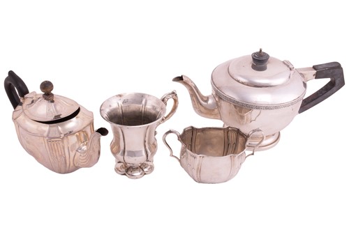 Lot 518 - An Edward VII silver teapot, with ebonised...