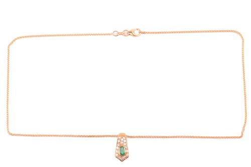Lot 42 - An emerald and diamond pendant on chain and a...