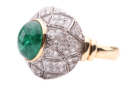Lot 180 - An emerald and diamond bombé ring, featuring...