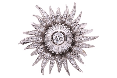 Lot 198 - A diamond star brooch, designed as a radiant...