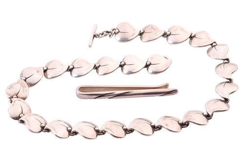 Lot 124 - A George Jensen silver tie clip and a Niels...