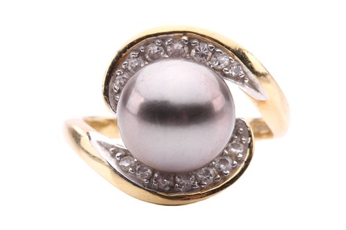 Lot 194 - A Tahitian pearl and diamond dress ring in...