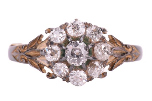 Lot 352 - A diamond daisy head cluster ring, set with...