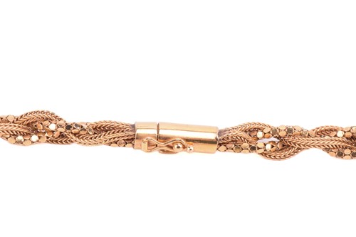Lot 45 - A braided link necklace comprising an...