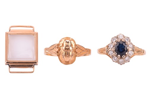 Lot 242 - A sapphire and diamond cluster ring in 18ct,...