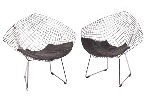 Lot 161 - A pair of diamond-style chairs, after Harry...