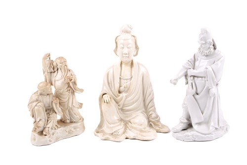 Lot 135 - A Chinese Blanc de Chine porcelain figure of...