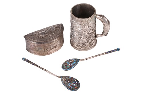 Lot 130 - A 19th-century South Burmese silver crescent...