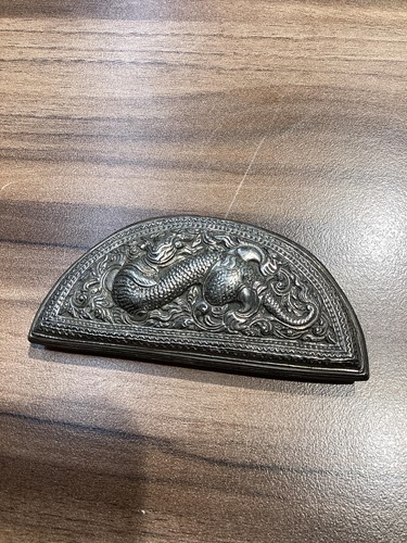 Lot 130 - A 19th-century South Burmese silver crescent...