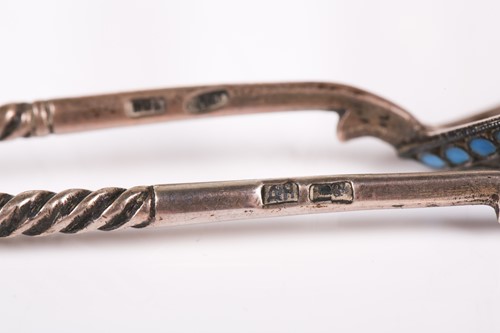 Lot 130 - A 19th-century South Burmese silver crescent...