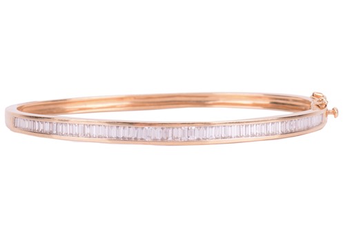 Lot 238 - A diamond-set hinged bracelet, bangle...