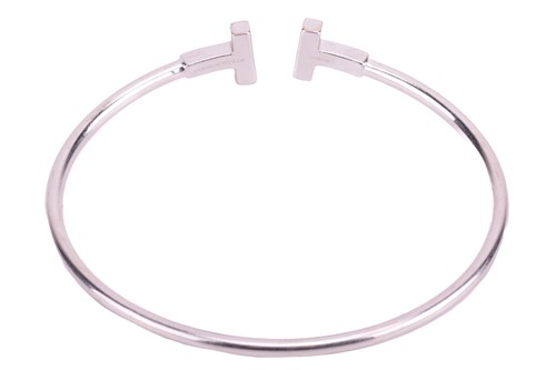 Lot 90 - Tiffany & Co. - a Tiffany T wire bracelet in...