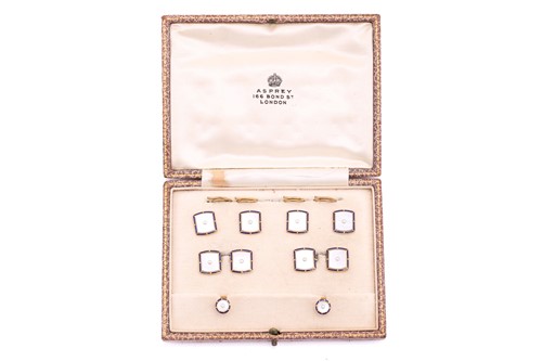 Lot 162 - Asprey - a boxed dress set comprising dress...