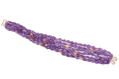 Lot 126 - A five-row amethyst beaded necklace,...