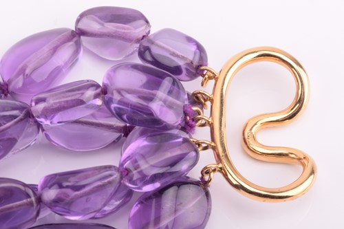 Lot 126 - A five-row amethyst beaded necklace,...