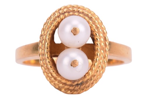 Lot 120 - A pearl-set dress ring, mounted with two round...