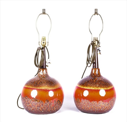 Lot 308 - A pair of mid-century lava-effect pottery...