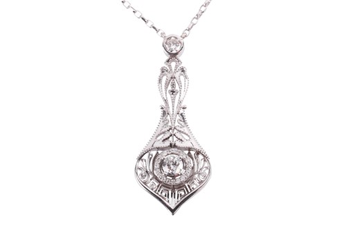 Lot 59 - A peacock feather diamond pendant and chain,...