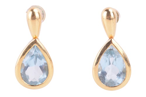 Lot 26 - A pair of sky blue topaz drop earrings in 18ct...