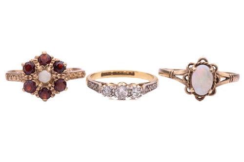 Lot 181 - Three gem-set rings; to include a diamond...