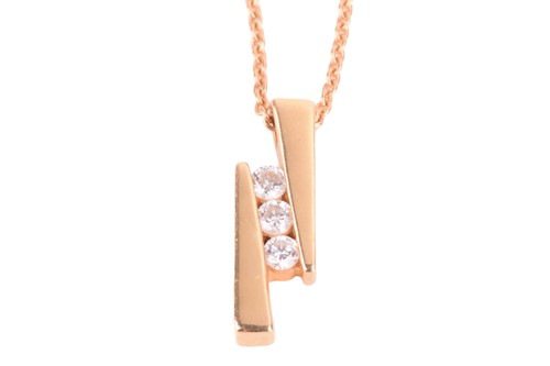 Lot 301 - A diamond-set geometrical pendant on a chain,...
