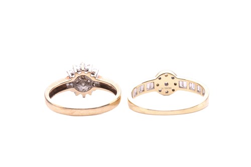 Lot 21 - Two diamond cluster rings; the first in the...