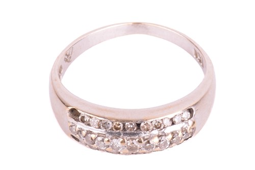 Lot 54 - A three-row diamond dress ring, centred with a...