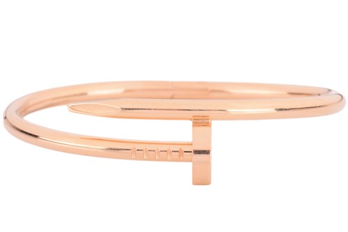 Lot 292 - Cartier - a 'Juste un Clou' hinged bracelet in...