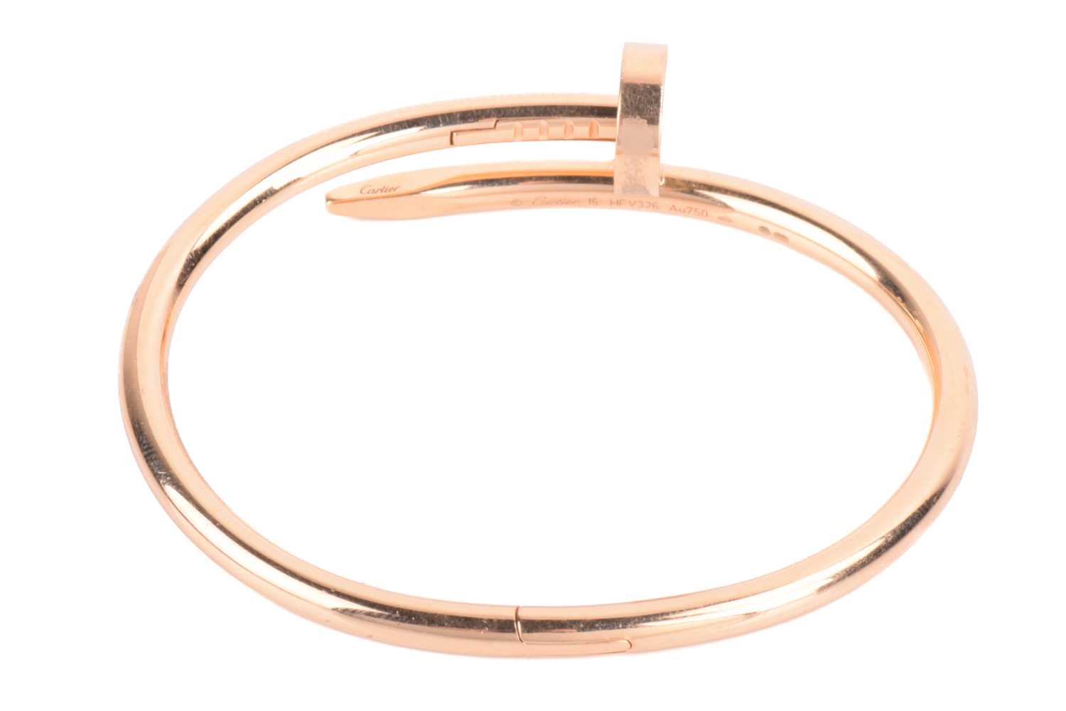 Lot 292 - Cartier - a 'Juste un Clou' hinged bracelet in...