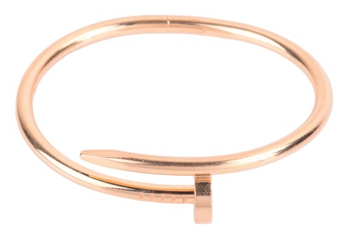 Lot 292 - Cartier - a 'Juste un Clou' hinged bracelet in...